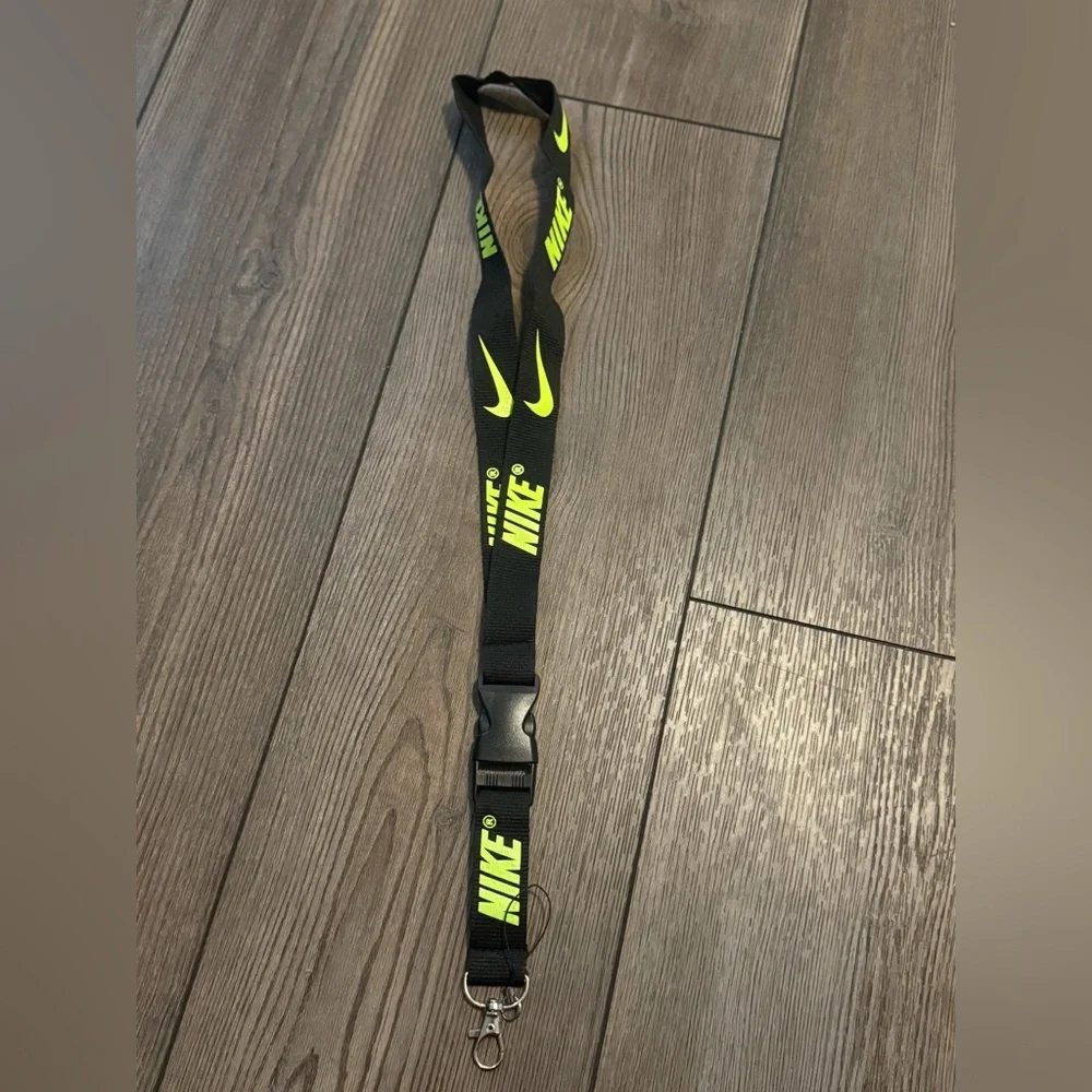 Black Nike Lanyard with Neon Green Letters